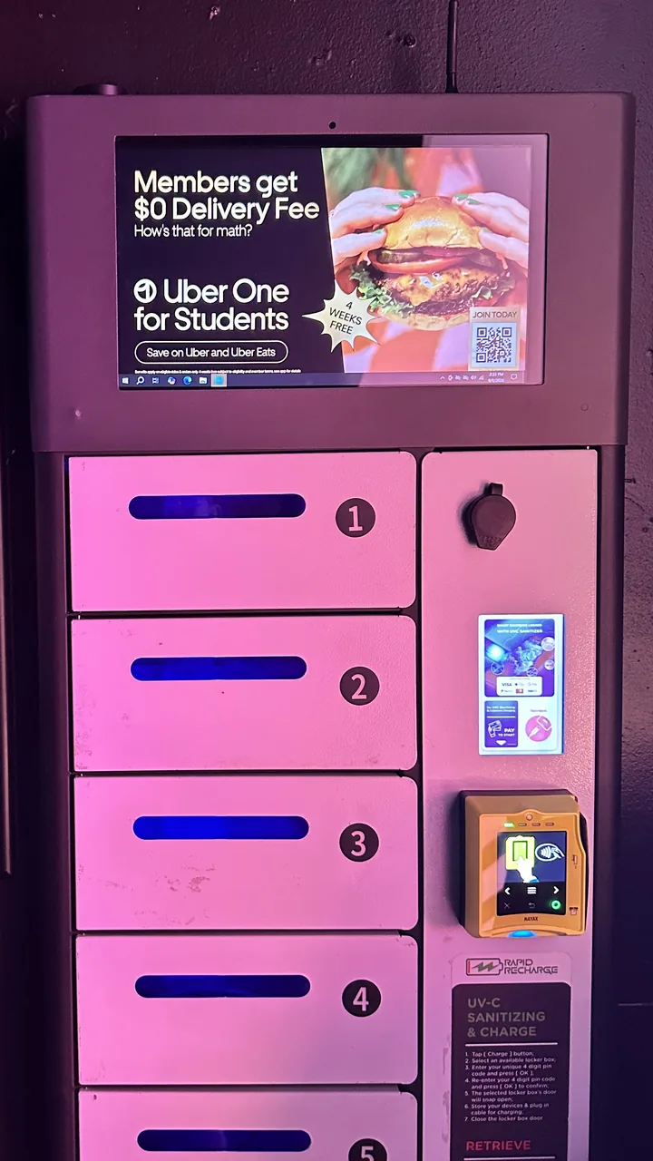 Charging locker with a full-color advertisement playing on its screen