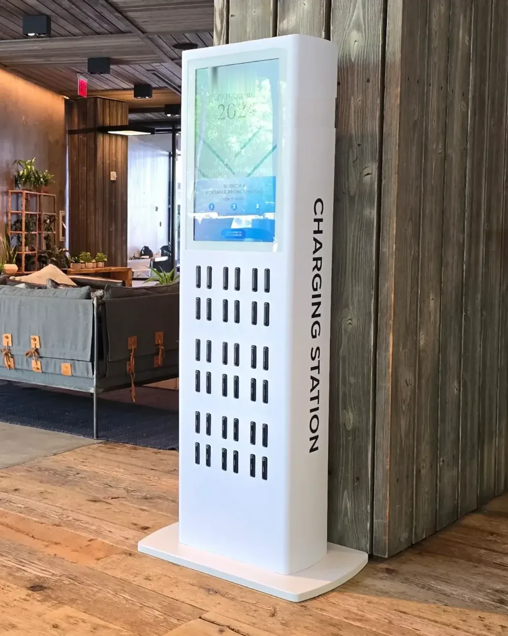 Portable phone-charger rental station with a large ad screen