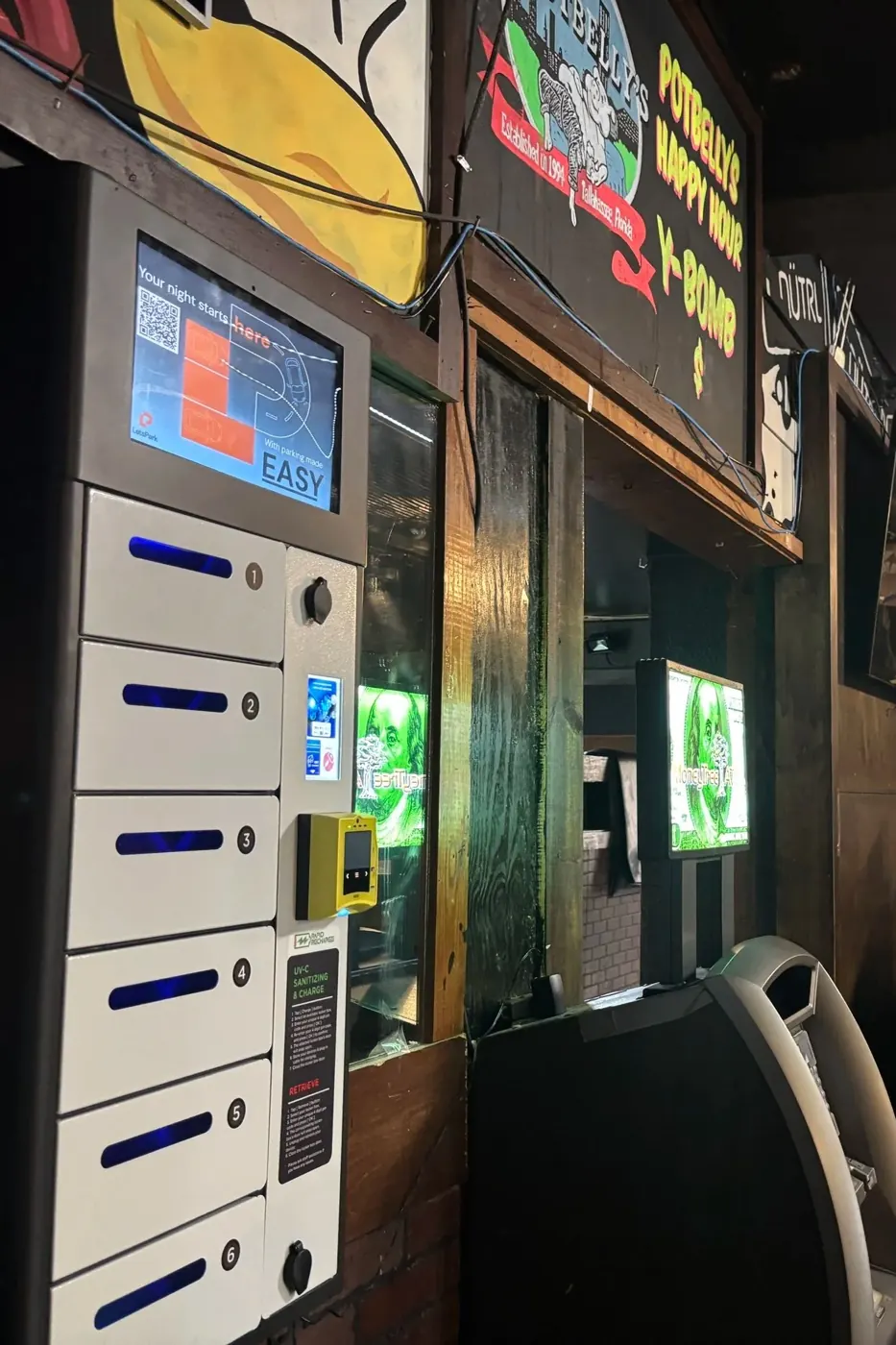 Charging locker beside the entrance of a live-music bar